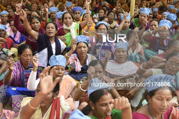 All-Assam Mid-Day Meal Workers Union activists stage a protest against government's move to hand over the Mid-Day Meal Scheme to NGO, during...