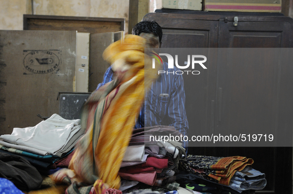 Vikram- A buyer of old clothes who buys stuff in auction and sells it on the streets during the old clothes auction at The Russell Exchange...