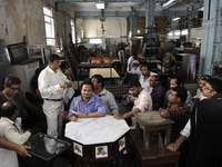 Md. Omar (guy with the black cap) conducting a furniture auction during the Auction at The Russell Exchange on 5th April , 2015 in Kolkata,...