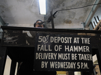 Sheikh Samsuddinan- The Auctioneer sitting on the high chair during the Auction at The Russell Exchange on 5th April , 2015 in Kolkata, Indi...