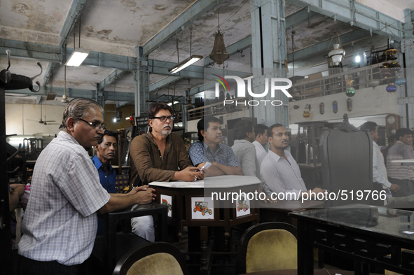 Customers lined up to bid for the furniture auction at The Russell Exchange on 5th April , 2015 in Kolkata, India. The Russell Exchange loca...