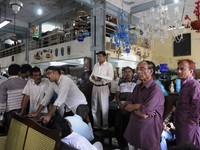 Md. Omar (guy with the black cap) conducting a furniture auction during the Auction at The Russell Exchange on 5th April , 2015 in Kolkata,...