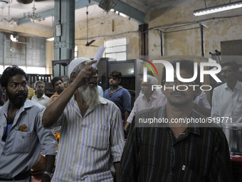 Mr. Hassan (the guy shouting ) who has been coming here for the last 40 years along with Sadhu Sarma a carpenter by profession during the Au...