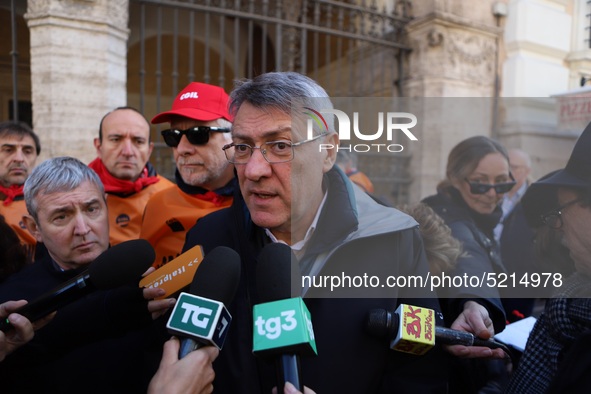 General Secretary of the Italian General Confederation of Labour (CGIL), Maurizio Landini addresses the media during a protest of ex-Ilva wo...