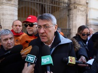 General Secretary of the Italian General Confederation of Labour (CGIL), Maurizio Landini addresses the media during a protest of ex-Ilva wo...