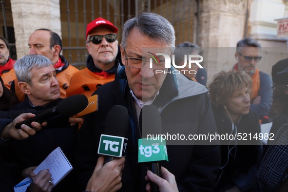 General Secretary of the Italian General Confederation of Labour (CGIL), Maurizio Landini addresses the media during a protest of ex-Ilva wo...