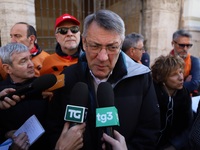 General Secretary of the Italian General Confederation of Labour (CGIL), Maurizio Landini addresses the media during a protest of ex-Ilva wo...