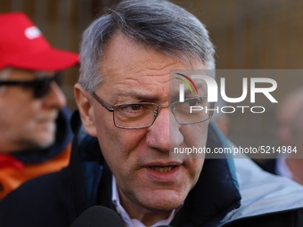 General Secretary of the Italian General Confederation of Labour (CGIL), Maurizio Landini addresses the media during a protest of ex-Ilva wo...