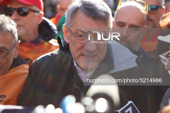 General Secretary of the Italian General Confederation of Labour (CGIL), Maurizio Landini addresses the media during a protest of ex-Ilva wo...