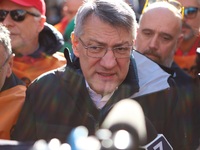 General Secretary of the Italian General Confederation of Labour (CGIL), Maurizio Landini addresses the media during a protest of ex-Ilva wo...