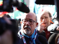 General Secretary of the Italian General Confederation of Labour (CGIL), Maurizio Landini addresses the media during a protest of ex-Ilva wo...