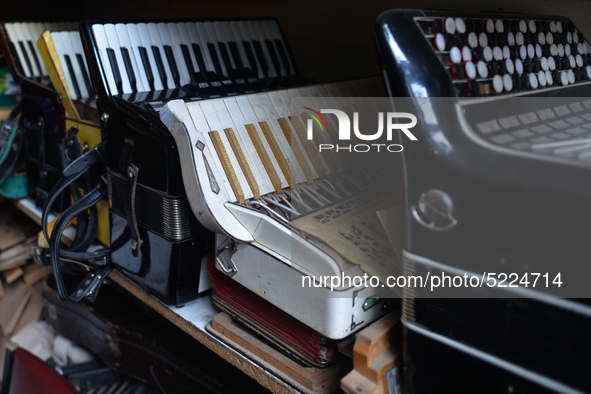 Accordions awaiting repairs inside Jozef Gmyrek's workshop, located in Rzeszow's city center.
His work is not a job but a passion that has k...