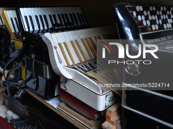 Accordions awaiting repairs inside Jozef Gmyrek's workshop, located in Rzeszow's city center.
His work is not a job but a passion that has k...