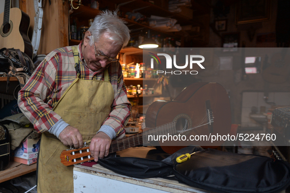 Former theatre actor and long time artist and luthier, Jozef Gmyrek (age 71), repairs a guitar in his workshop.
His work is not a job but a...