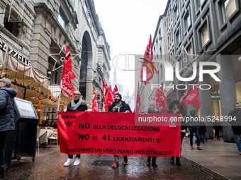 Employees of the well-known clothing brand Adidas protest in front of the Adidas store in Milan against the 41 dismissals due to the relocat...