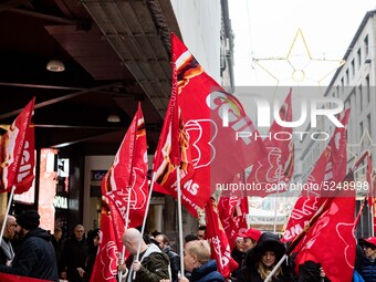 Employees of the well-known clothing brand Adidas protest in front of the Adidas store in Milan against the 41 dismissals due to the relocat...