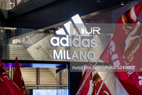 Employees of the well-known clothing brand Adidas protest in front of the Adidas store in Milan against the 41 dismissals due to the relocat...