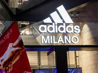 Employees of the well-known clothing brand Adidas protest in front of the Adidas store in Milan against the 41 dismissals due to the relocat...