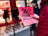 Employees of the well-known clothing brand Adidas protest in front of the Adidas store in Milan against the 41 dismissals due to the relocat...