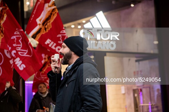 Employees of the well-known clothing brand Adidas protest in front of the Adidas store in Milan against the 41 dismissals due to the relocat...