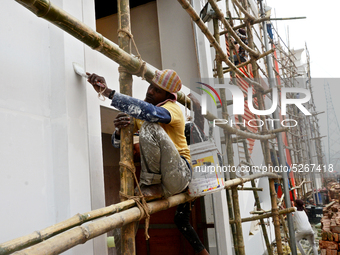 Bangladeshi day labor works at the construction site of Dhaka international Trade Fair in Dhaka, Bangladesh, on December 26, 2019. (