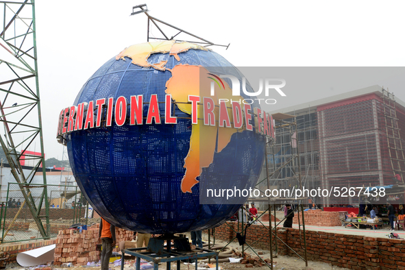 Bangladeshi day labor works at the construction site of Dhaka international Trade Fair in Dhaka, Bangladesh, on December 26, 2019. 