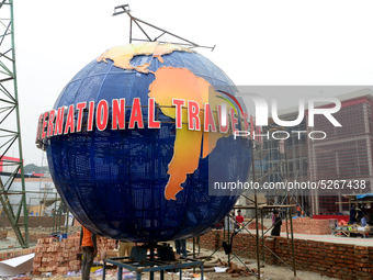 Bangladeshi day labor works at the construction site of Dhaka international Trade Fair in Dhaka, Bangladesh, on December 26, 2019. (