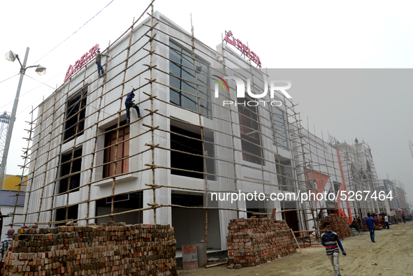 Bangladeshi day labor works at the construction site of Dhaka international Trade Fair in Dhaka, Bangladesh, on December 26, 2019. 