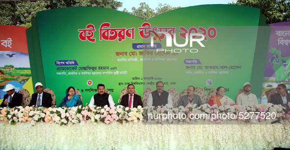 Bangladeshi politicians attend to students to celebrate on the first day of the New Year in Dhaka on January 1, 2020. The Bangladesh governm...