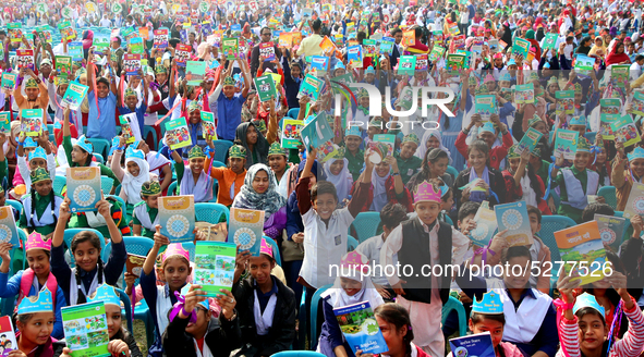 Bangladeshi Students receive free textbooks from government to celebrate on the first day of the New Year in Dhaka on January 1, 2020. The B...