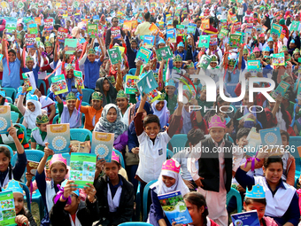 Bangladeshi Students receive free textbooks from government to celebrate on the first day of the New Year in Dhaka on January 1, 2020. The B...