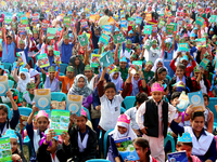 Bangladeshi Students receive free textbooks from government to celebrate on the first day of the New Year in Dhaka on January 1, 2020. The B...