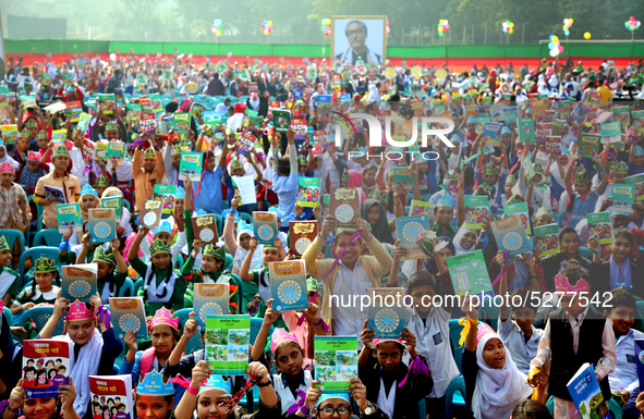 Bangladeshi Students receive free textbooks from government to celebrate on the first day of the New Year in Dhaka on January 1, 2020. The B...