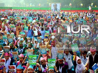 Bangladeshi Students receive free textbooks from government to celebrate on the first day of the New Year in Dhaka on January 1, 2020. The B...