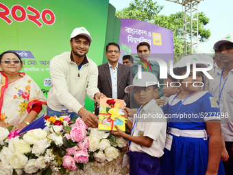 Bangladeshi Students receive free textbooks from government to celebrate on the first day of the New Year in Dhaka on January 1, 2020. The B...