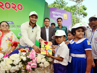 Bangladeshi Students receive free textbooks from government to celebrate on the first day of the New Year in Dhaka on January 1, 2020. The B...