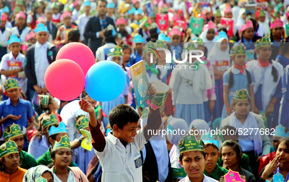 Bangladeshi Students receive free textbooks from government to celebrate on the first day of the New Year in Dhaka on January 1, 2020. The B...