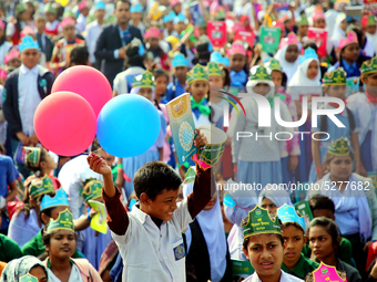 Bangladeshi Students receive free textbooks from government to celebrate on the first day of the New Year in Dhaka on January 1, 2020. The B...