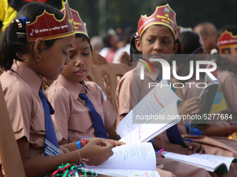 Bangladeshi Students receive free textbooks from government to celebrate on the first day of the New Year in Dhaka on January 1, 2020. The B...