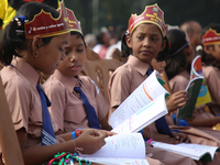 Bangladeshi Students receive free textbooks from government to celebrate on the first day of the New Year in Dhaka on January 1, 2020. The B...