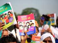 Bangladeshi Students receive free textbooks from government to celebrate on the first day of the New Year in Dhaka on January 1, 2020. The B...