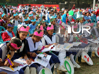 Bangladeshi Students receive free textbooks from government to celebrate on the first day of the New Year in Dhaka on January 1, 2020. The B...