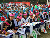 Bangladeshi Students receive free textbooks from government to celebrate on the first day of the New Year in Dhaka on January 1, 2020. The B...