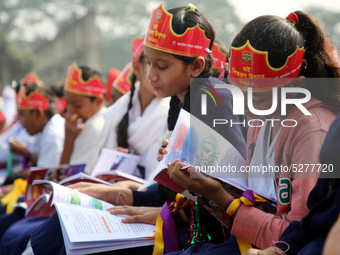 Bangladeshi Students receive free textbooks from government to celebrate on the first day of the New Year in Dhaka on January 1, 2020. The B...