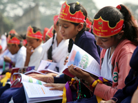 Bangladeshi Students receive free textbooks from government to celebrate on the first day of the New Year in Dhaka on January 1, 2020. The B...