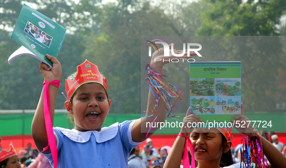 Bangladeshi Students receive free textbooks from government to celebrate on the first day of the New Year in Dhaka on January 1, 2020. The B...