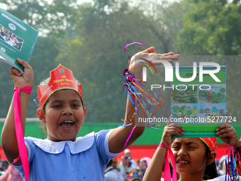 Bangladeshi Students receive free textbooks from government to celebrate on the first day of the New Year in Dhaka on January 1, 2020. The B...