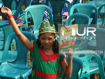 Bangladeshi Students receive free textbooks from government to celebrate on the first day of the New Year in Dhaka on January 1, 2020. The B...