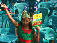 Bangladeshi Students receive free textbooks from government to celebrate on the first day of the New Year in Dhaka on January 1, 2020. The B...