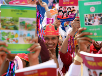 Bangladeshi Students receive free textbooks from government to celebrate on the first day of the New Year in Dhaka on January 1, 2020. The B...